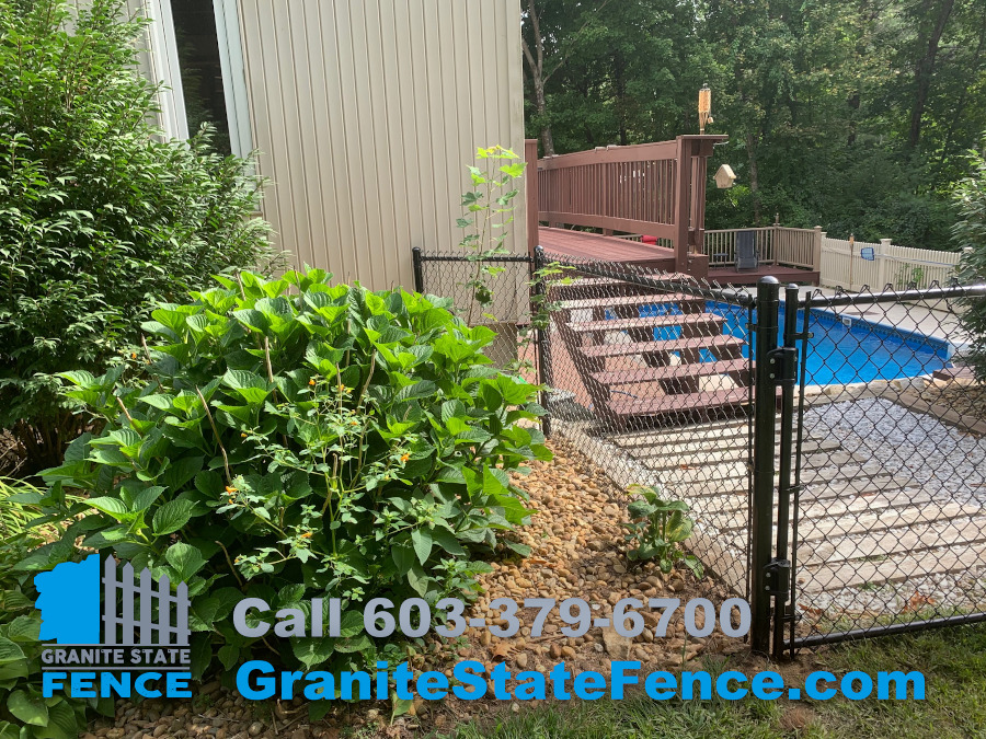 Black Chain Link Pool Fencing installed in Londonderry, NH.