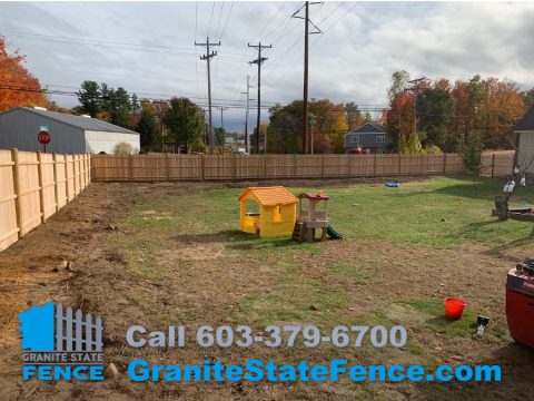 Cedar Stockade Fence installation in Hudson, NH. | Granite State Fence