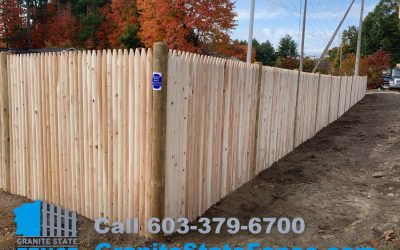 Cedar Stockade Fence installation in Hudson, NH.