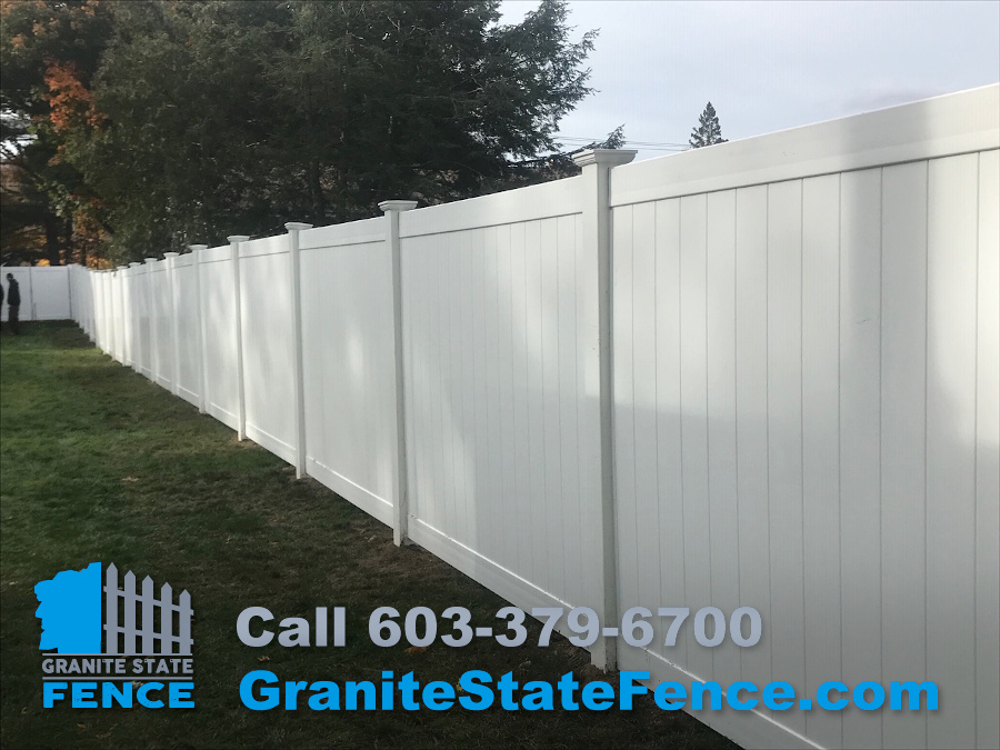 White Privacy Vinyl Fencing installation in Manchester, NH.