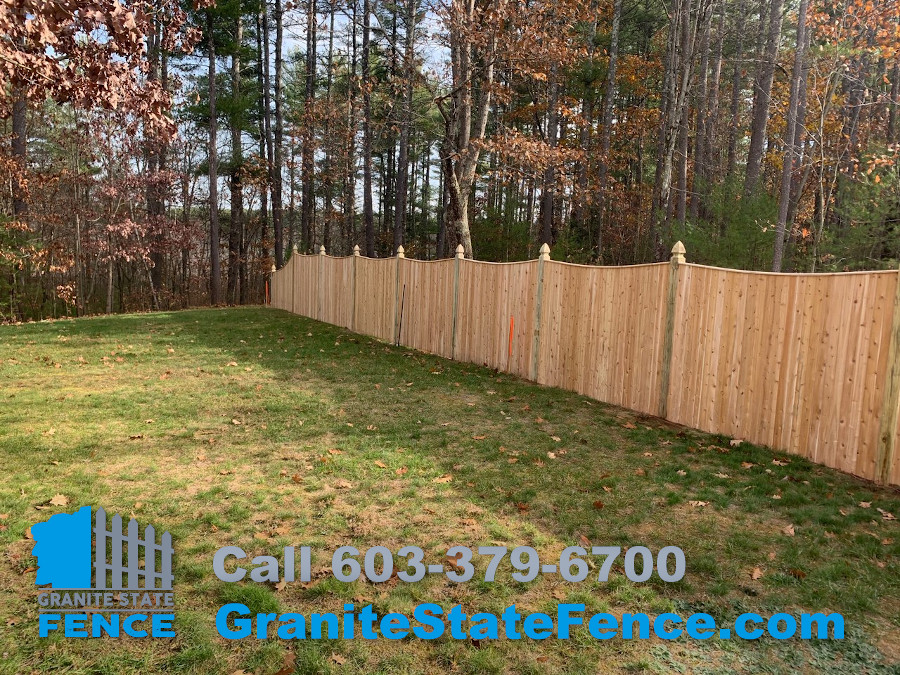 Cedar Scalloped Wood Fence and Chain Link Fencing installed in Brookline, NH.