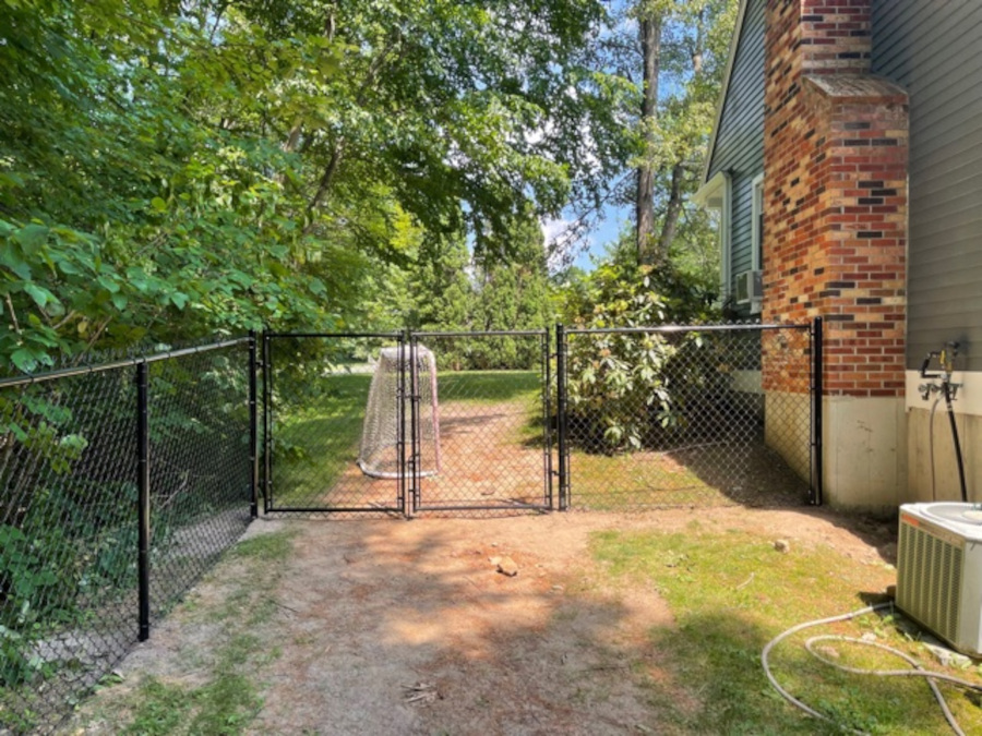 Chain Link Fencing installation in Derry, NH. 