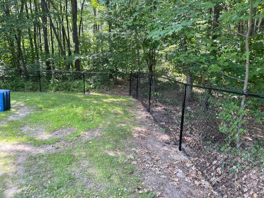 Chain Link Fencing installation in Derry, NH. 