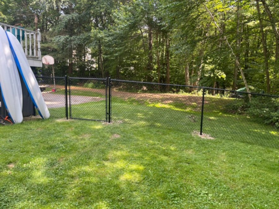 Chain Link Fencing installation in Derry, NH. 