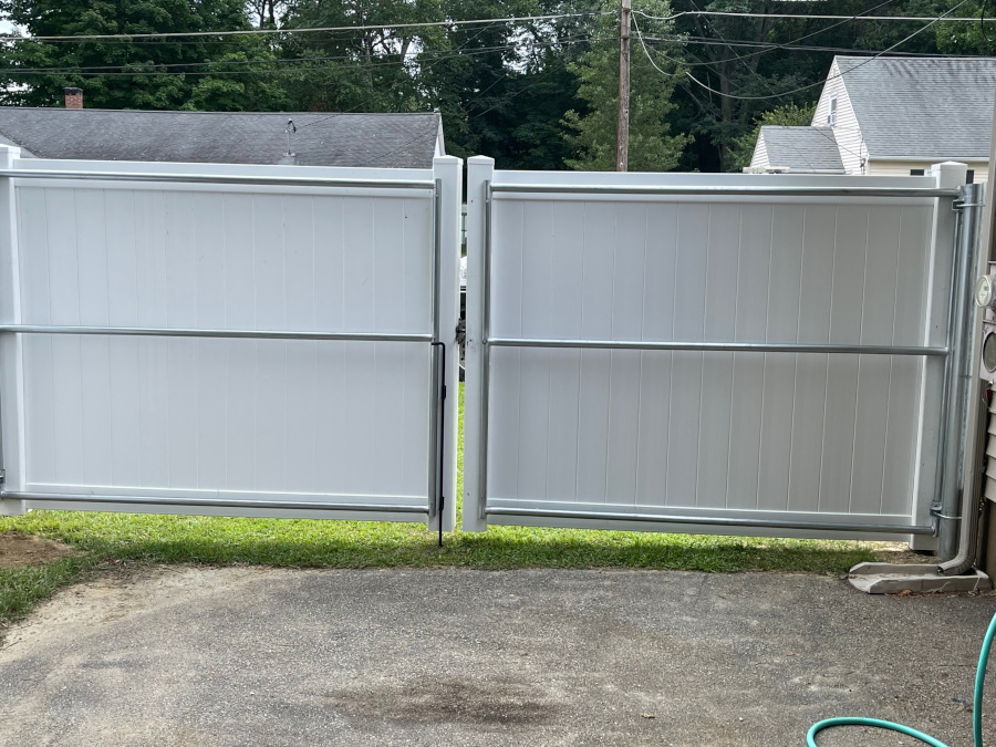 Vinyl Privacy Fence installation in Nashua, NH.