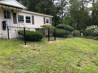 Vinyl Coated Chain Link Fence installed in Hooksett, NH.