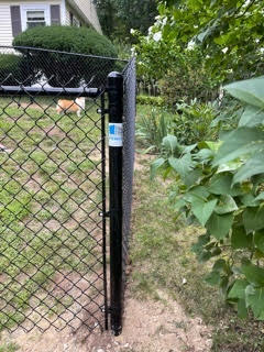 Vinyl Coated Chain Link Fence installed in Hooksett, NH.