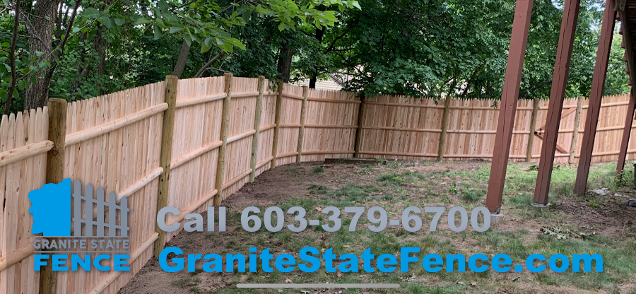 Cedar Stockade Fence installed in Chelmsford, MA.