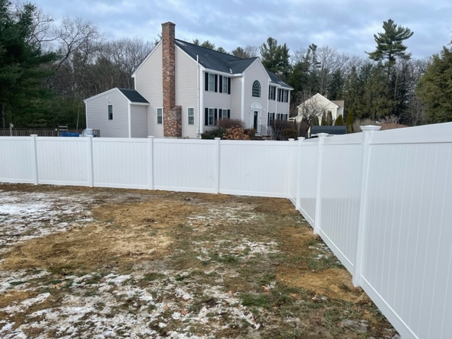 Granite State Fence installed a white vinyl privacy fence for a residential property in Londonderry, NH.
