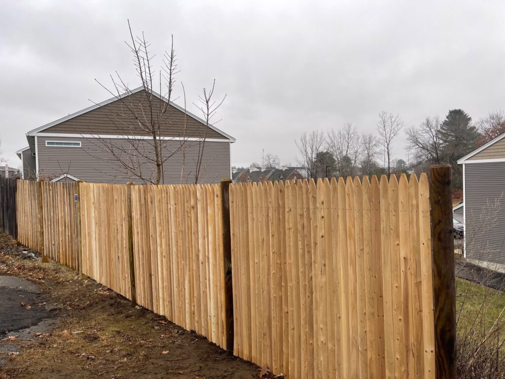 Granite State Fence installed a cedar stockade fence for this yard in Derry,
NH