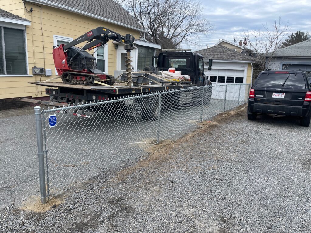 
For this job, Granite State Fence visited Nashua, NH to install galvanized
chain Link fencing.