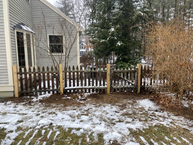 Wood Fence Maintenance in Litchfield, NH.