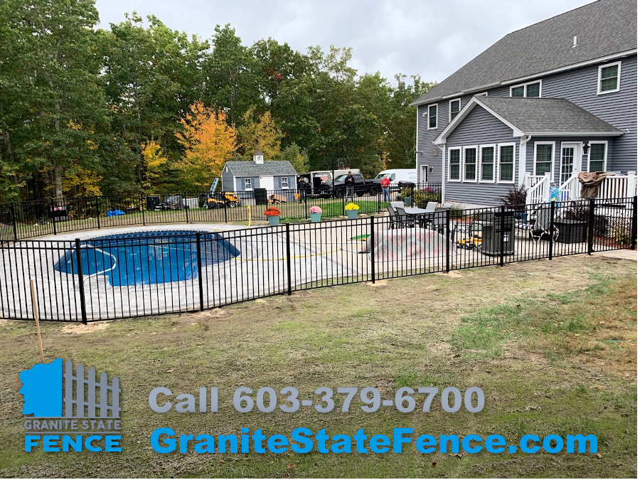3 rail black aluminum fence installed for a pool area in Auburn, NH.