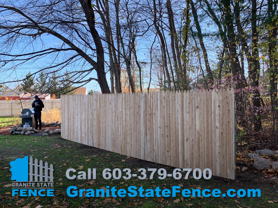 Commercial Fencing install for visual barrier in Hooksett, NH.