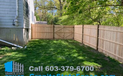 Cedar Stockade Privacy Fence and Chain Link Fence Installation in Chelmsford, MA.