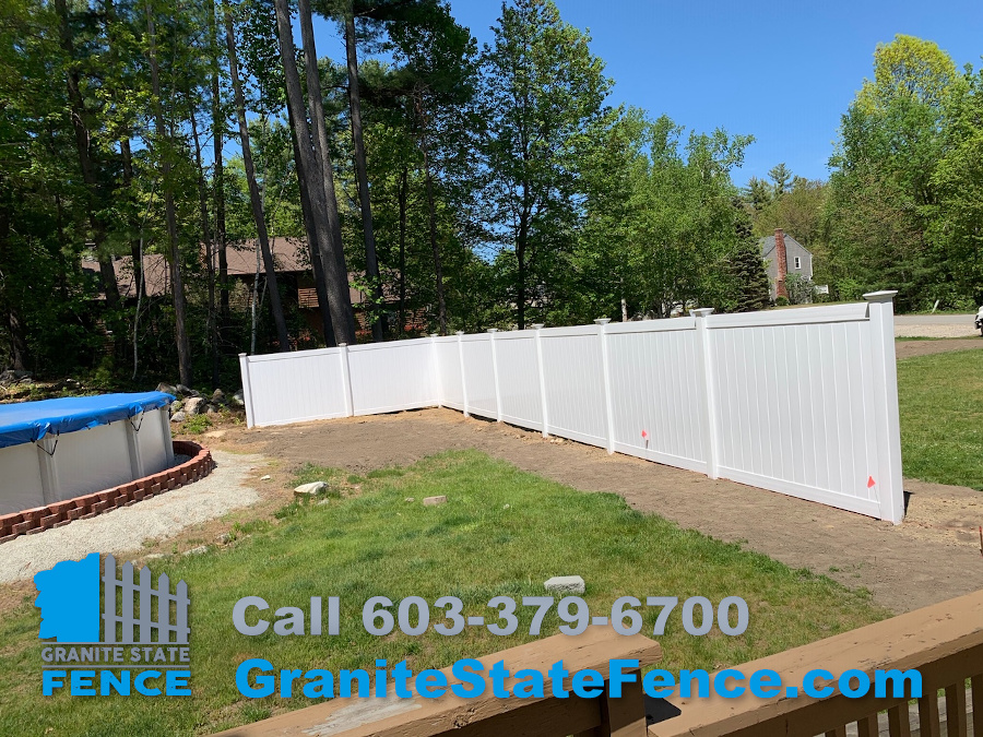 Fence Company in Londonderry installs Vinyl Privacy fence to enclose pool.