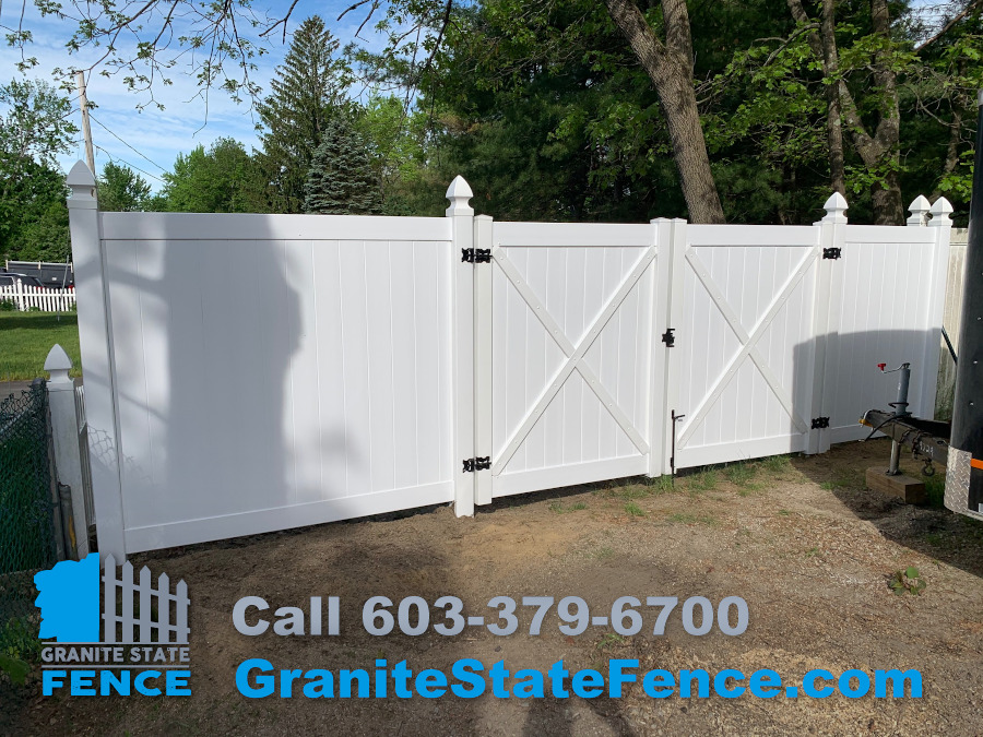 White Privacy Vinyl with double drive gate installed in Hudson, NH