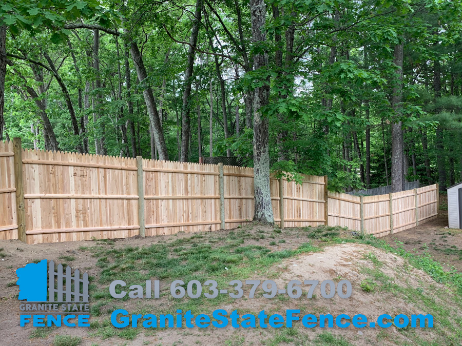 Cedar Stockade Fence Install to create privacy in Merrimack, NH.