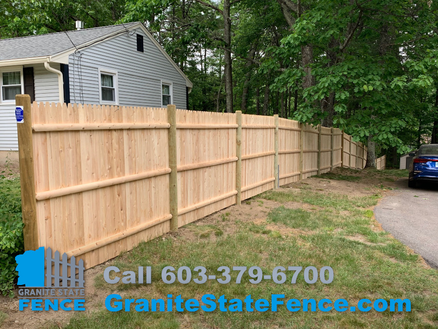 Cedar Stockade Fence Install to create privacy in Merrimack, NH.