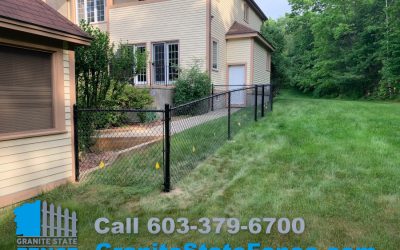 Black vinyl coated chain link fence installed in Windham, NH.