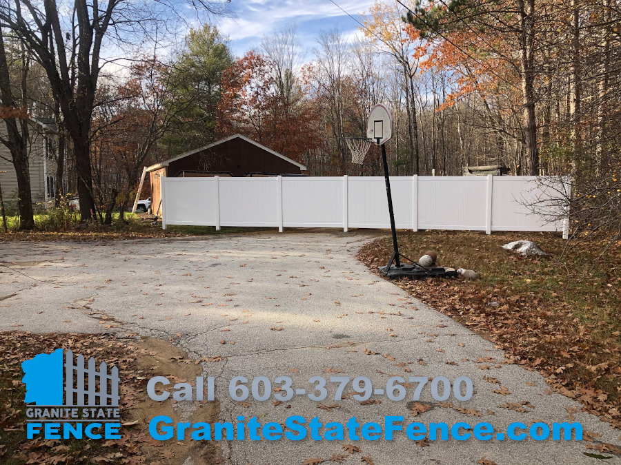 White Vinyl Privacy Fence installed in Gilmanton, NH.