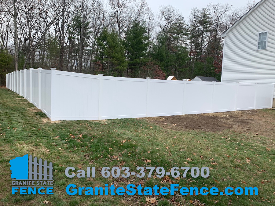 Vinyl Privacy Fence for pool area installed in Hooksett, NH.