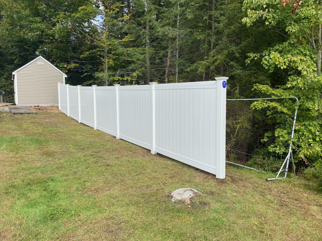 We installed 6' White Vinyl privacy fence at this residence in Chester, NH.