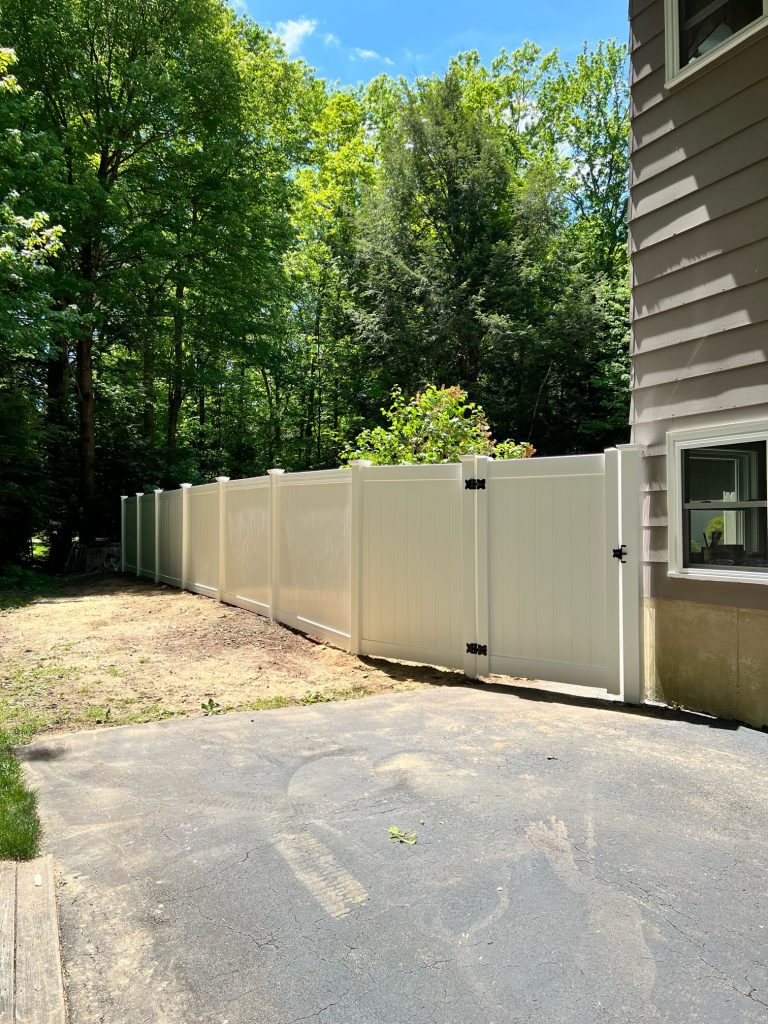 Granite State Fence installed 6' Vinyl Privacy fencing for this home in Merrimack, NH.