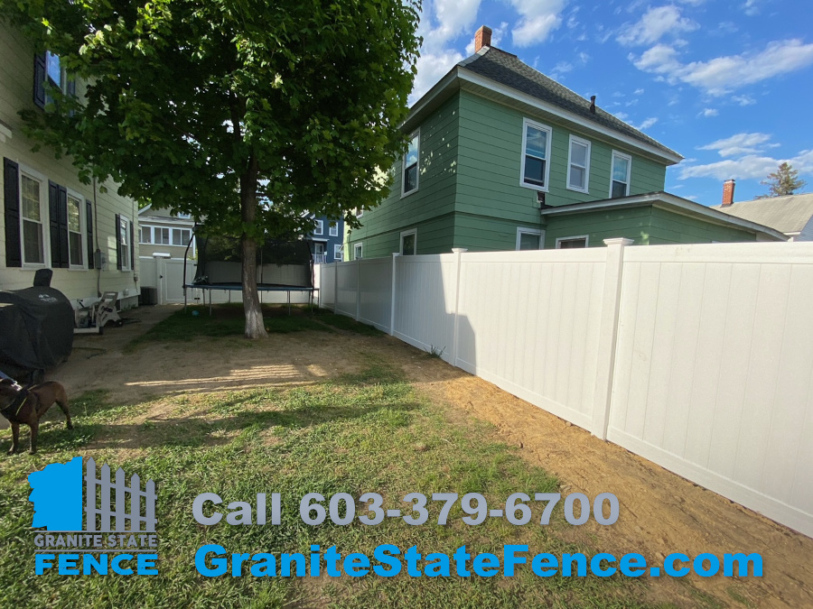 White Vinyl Privacy Fencing installed in Manchester, NH.