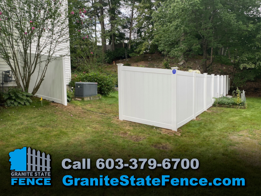 White Vinyl Privacy Fencing installed in Nashua, NH.