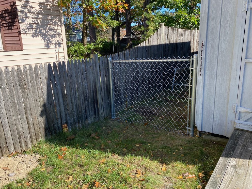 Chain Link Fence installation in Manchester, NH.