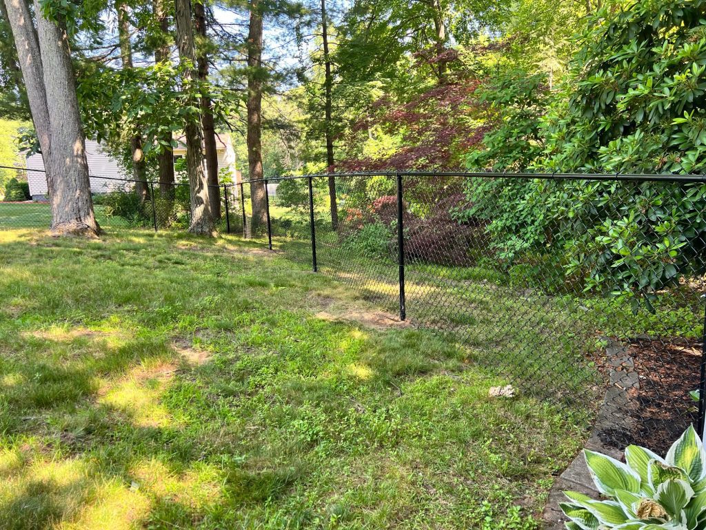 Black Chain Link Fencing Installation in Salem, NH.