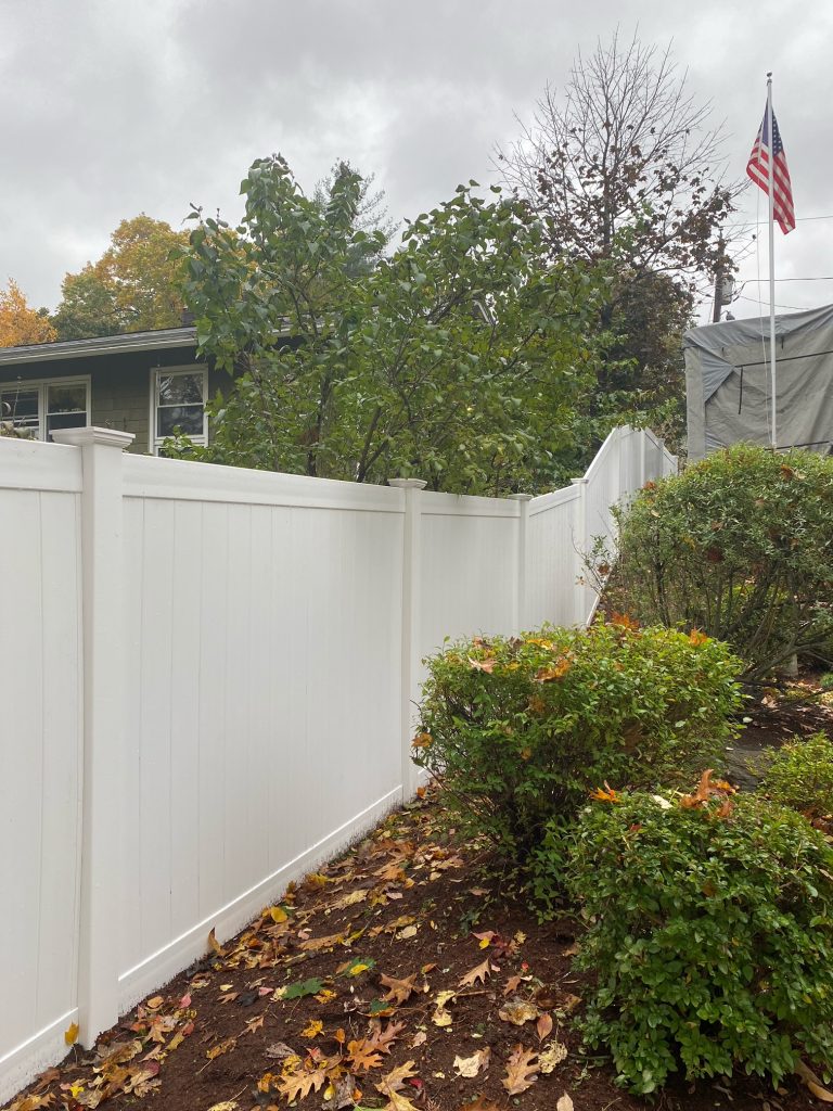 White Vinyl Privacy Fence installed in Manchester, NH.