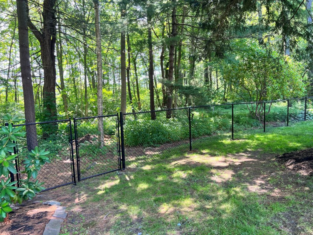 Black Chain Link Fencing Installation in Salem, NH.
