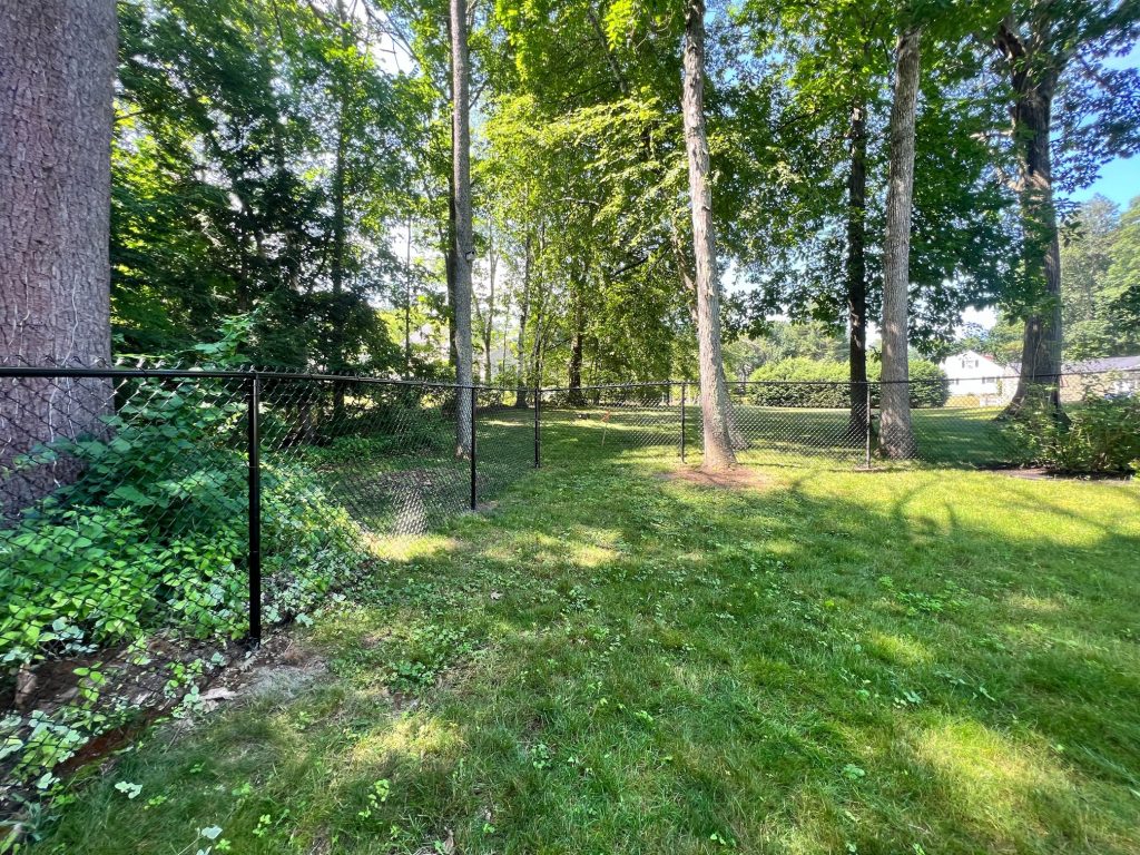 Black Chain Link Fencing Installation in Salem, NH.