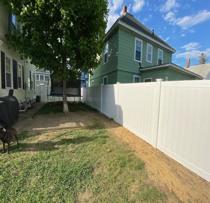 White Vinyl Privacy Fencing installed in Manchester, NH.