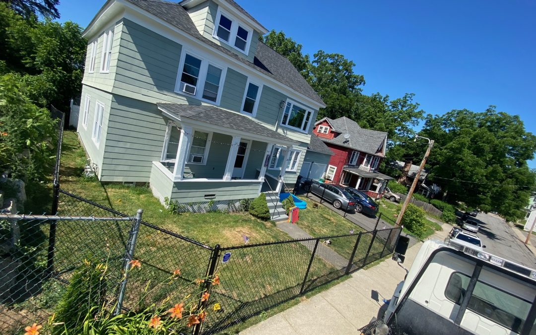 Black Vinyl Coated Chain Link Fence installed in Nashua, NH.